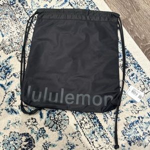 Brand new lululemon black drawstring bag